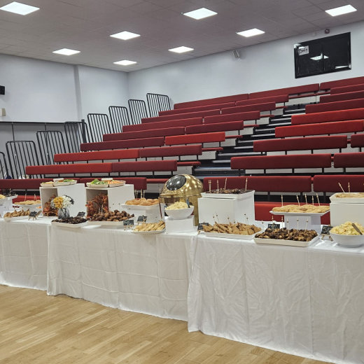 Long buffet table set up in an event hall